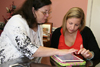 
Kathleen Bands, right, shows her mom, My Cleaning Services president Lisa Bands, how easy it is to use bidding software on an iPad.