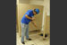 
This janitor, who works for Building Professionals of Texas Janitorial Service, in Houston, wears personal protective equipment while on the job in an industrial facility.
