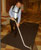 
Allen is demonstrating how to use a backpack vacuum to one of his customers. He refers to his customers as friends.
