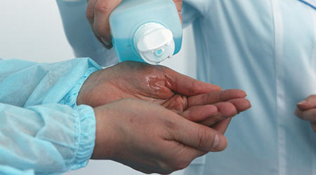 hand disinfection using liquid soap in healthcare facility
