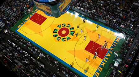 Milwaukee Bucks basketball court wood floor refinished to glossy shine