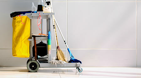 Cleaning Cart in the station.Cleaning cart with wall background