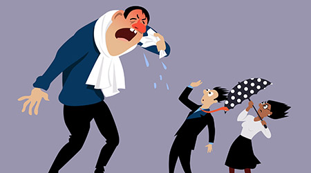 Sick man sneezing at terrified coworkers                                                                                                              