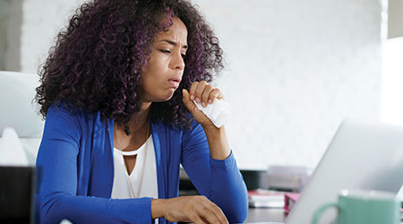 A lady coughing