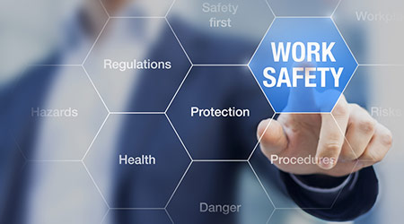 Man pushes button of symbol for safety