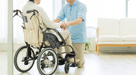 Senior women and caregiver