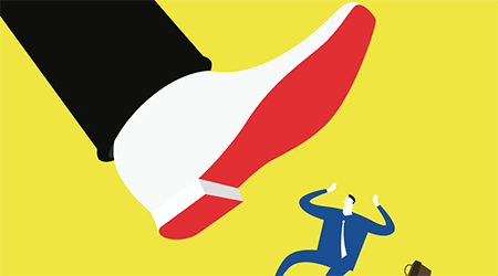 Illustration of large foot coming down on businessman