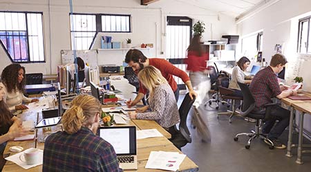 Interior Of Busy Design Office With Staff                                                                                                             