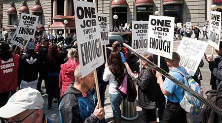 Hundreds of union represented hotel workers protest outside of the J.W. Marriott's Westin St. Francis hotel in San Francisco's Union Square on Labor Day