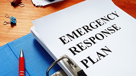 Open folder with Emergency response plan.