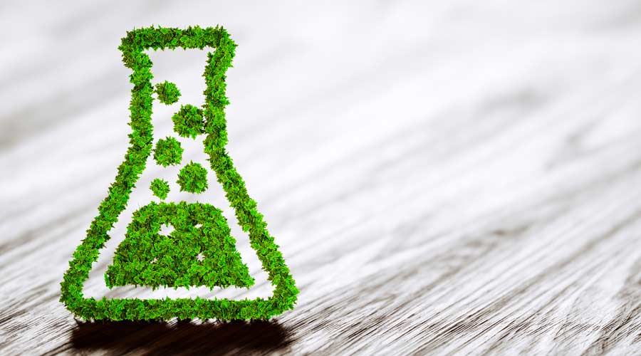 Green chemistry industry sign on black wooden background. 3D rendering.