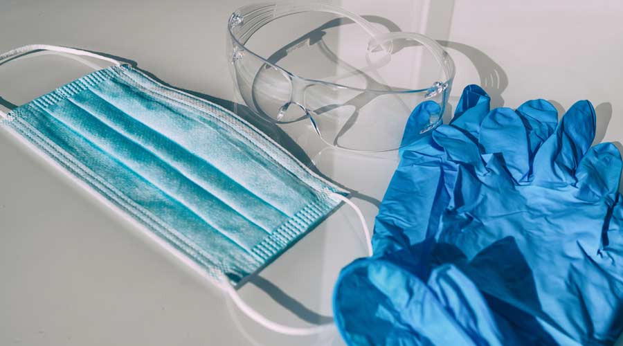 PPE COVID-19 Mask, gloves, protection glasses for healthcare workers. Shortage of personal protective equipment for coronavirus.