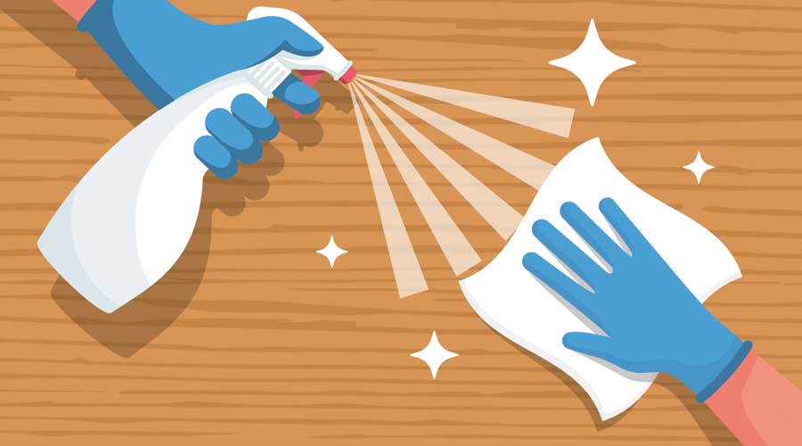 Cleaning wooden surface home or office. Spraying antibacterial sanitizing spray. Pollution prevention. Spray detergent. Napkin in hands. Protective rubber gloves. Hygiene home. Vector flat design.