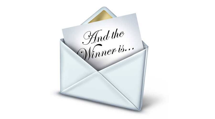 Award winner envelope with a white letter and gold trim unveiling the name of the winning recipient as a symbol of business or entertainment success and achievement on a white background.