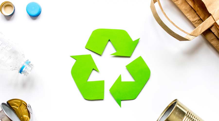 Eco concept with recycling symbol on table background top view mock up