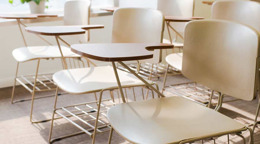 Light Brown School Chairs in A Clean Classroom of Simple Decoration