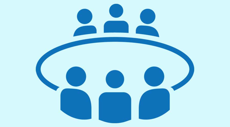 Board room members sitting around a table icon