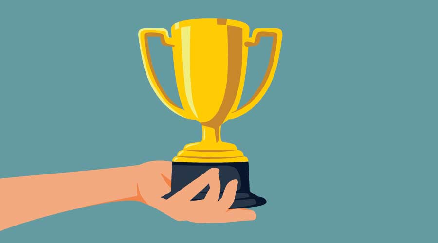 Hand Holding Trophy for the Winner Vector Cartoon Illustration. Person receiving a golden cup prize in a competition