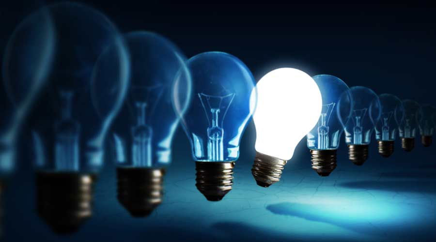 Lightbulbs on blue background, idea concept