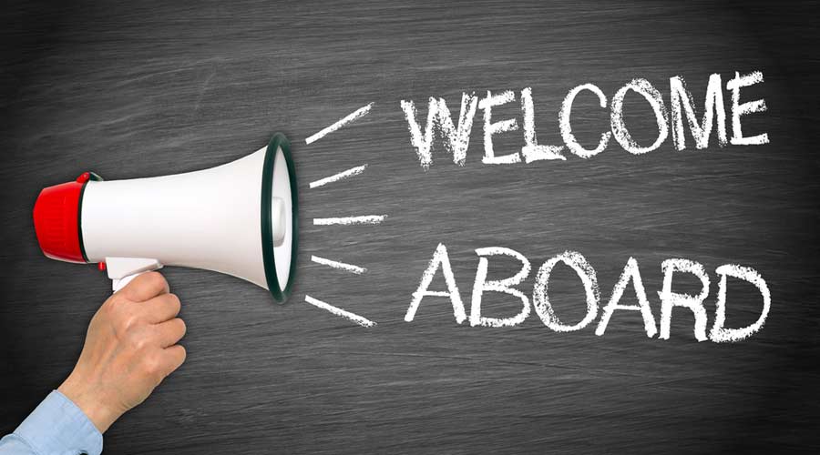 Welcome aboard - female hand with megaphone and text
