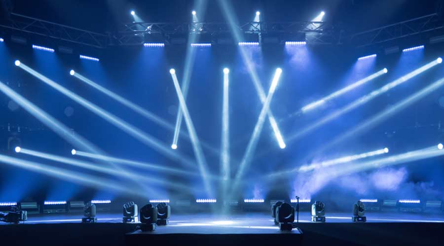 Online event entertainment concept. Background for online concert. Blue stage spotlights. Empty stage with blue spotlights. Blue stage lights. Online COVID-19 concert. Live streaming concert