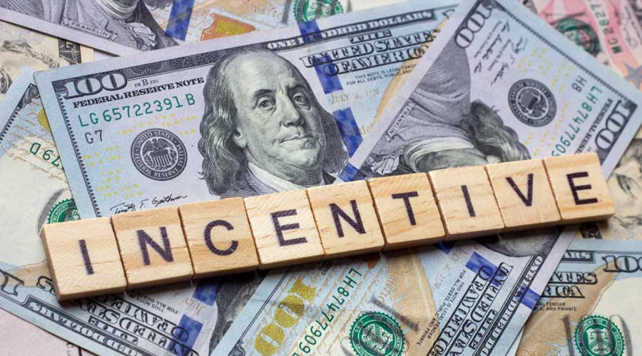 The word incentive on dollar usa background