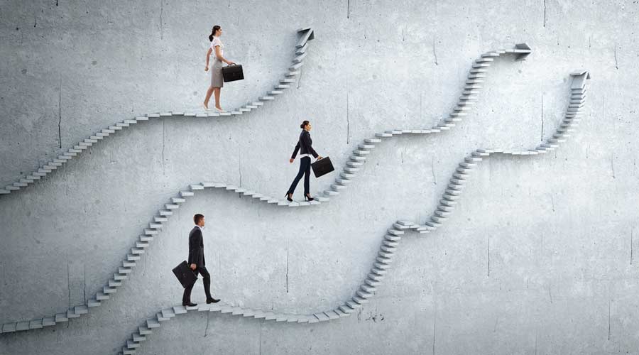 Businessman with suitcase running on stone staircase