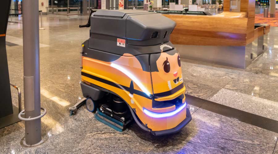 Singapore - January 2019: Cleaning robot operating automated work in Singapore Changi Airport.