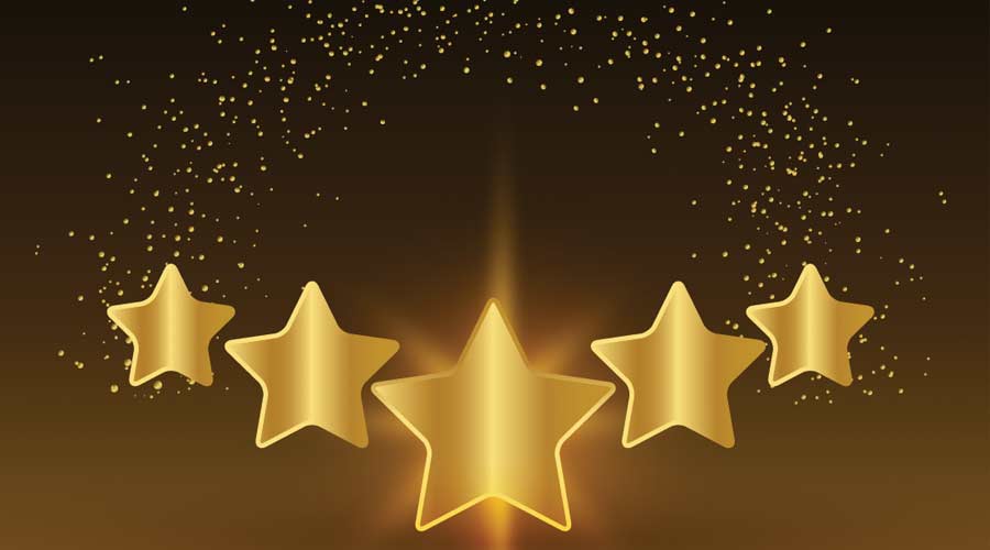 5 Stars shining on a golden background. Five star award.