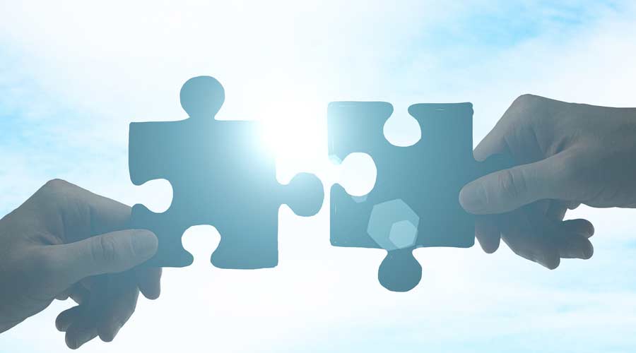 Partnership formed puzzle pieces