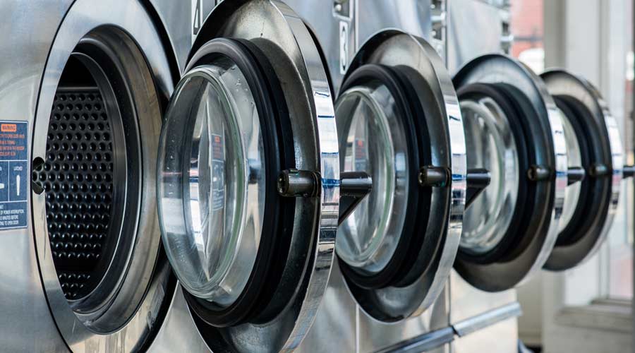 line of laundry machines
