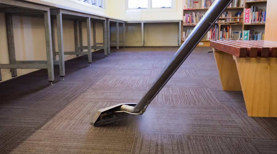 Vacuuming a carpet