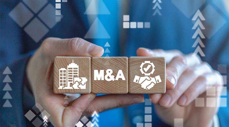 Merger and Acquisition Business Corporate Cooperation Company concept. MA partnership concept on wooden dices in businessman's hands