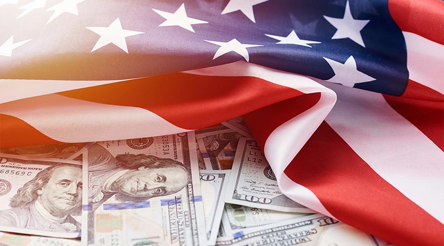 USA national flag and currency usd money banknotes. Business and finance concept
