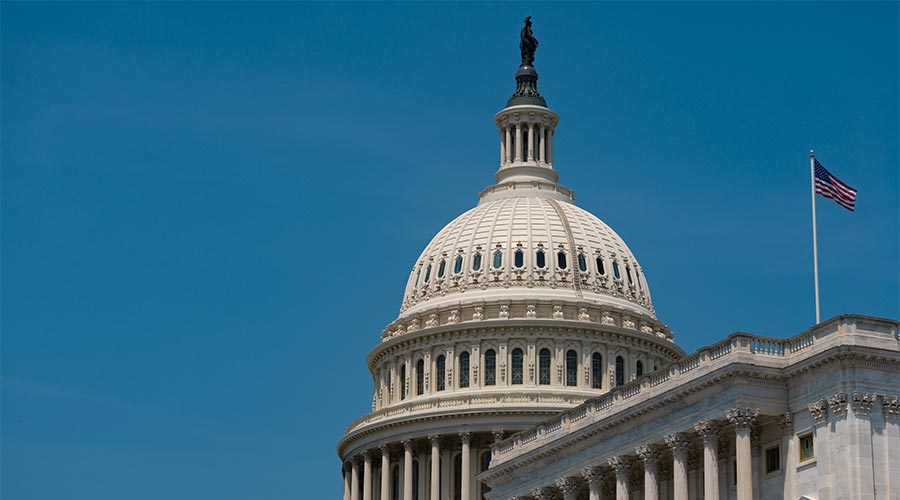 Congress in Washington, DC. Congress is the symbol of American democracy. Congress in Washington, DC. The Capitol dome rising over Capitol Hill. Washington DC skyline near Congress.