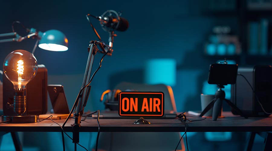 Live online radio studio desk with on air sign, entertainment and communication concept