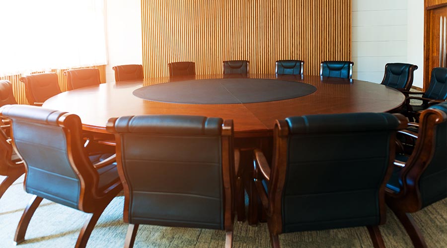 Conference table and chairs in modern meeting room