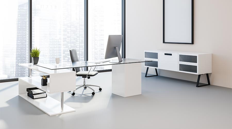 Manager office corner with peach walls, concrete floor, panoramic windows, a large computer desk and a vertical mock up poster frame. 3d rendering