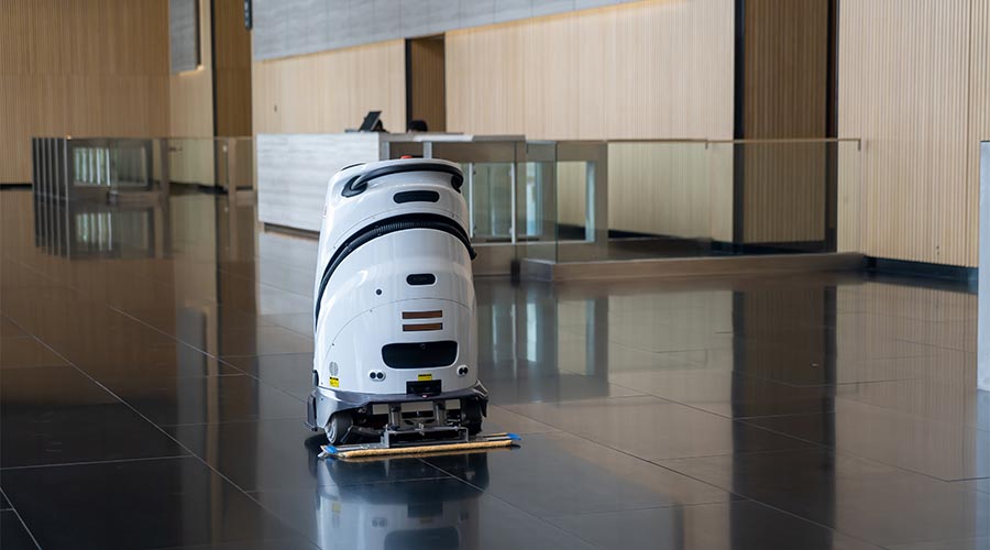 An autonomous floor cleaning robot diligently working in modern interior. equipped with advanced sensors and cleaning mechanisms, integration of cutting-edge technology in maintaining cleanliness