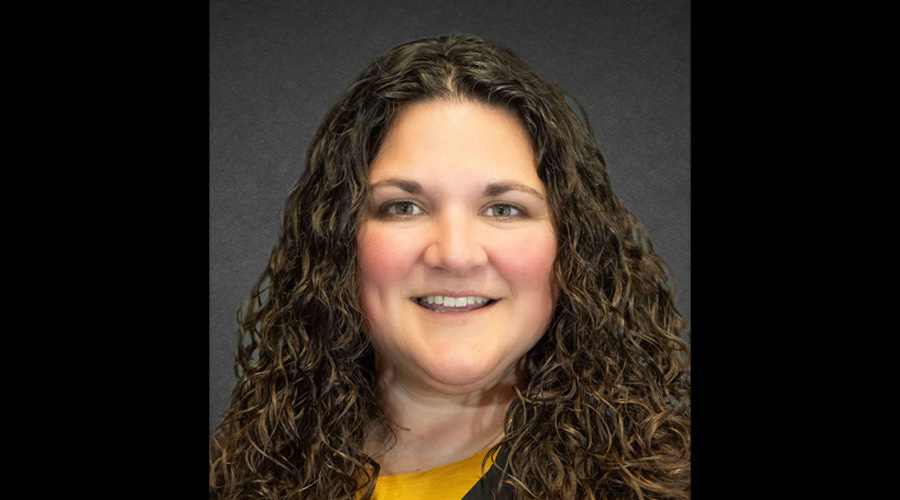Editorial headshot image of Editor-in-Chief Corinne Zudonyi