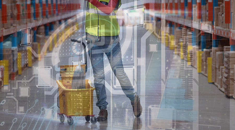 Digital interface with data processing over mid section of a worker cleaning the floor at warehouse. Logistics business and technology concept
