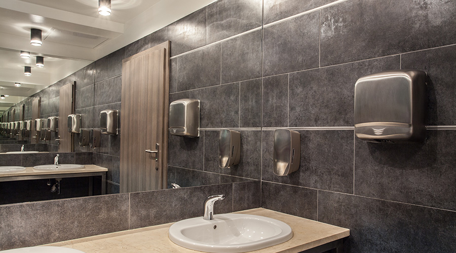 Public bathroom in gray colors